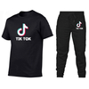Camiseta 2021 Tendencia Personaje Cuello redondo Camiseta de manga corta + Pantalones de jogging Traje casual