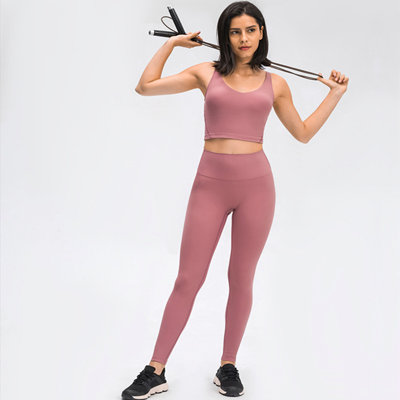 Conjuntos de yoga de cintura alta personalizados para mujeres Leggings sin costuras de 2 piezas Control de barriga Entrenamiento Correr Butt Push Up con tops deportivos